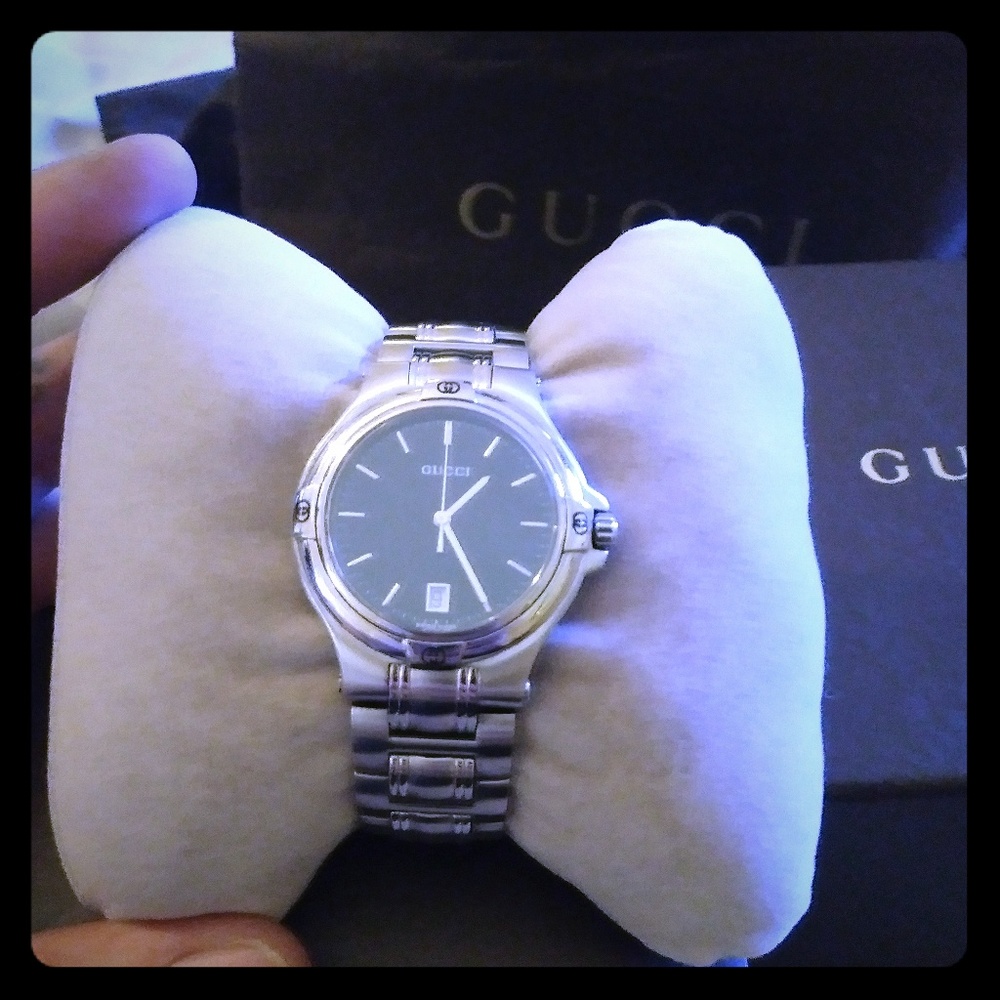 Mens white Gucci watch with black dial